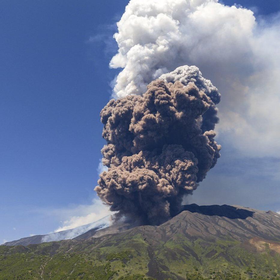 Sicily's Mount Etna erupts with columns of smoke and ash